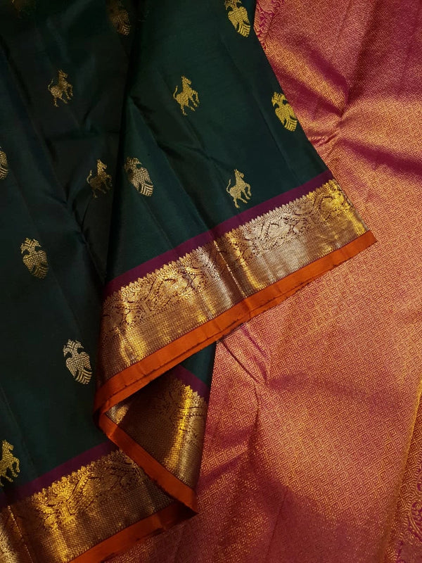 2G Pure Kanjivaram Silk Saree in Deep Bottle Green with Gold Zari Horse Buttas and Maroon Traditional Peacock Zari Border | Silkmark Certified