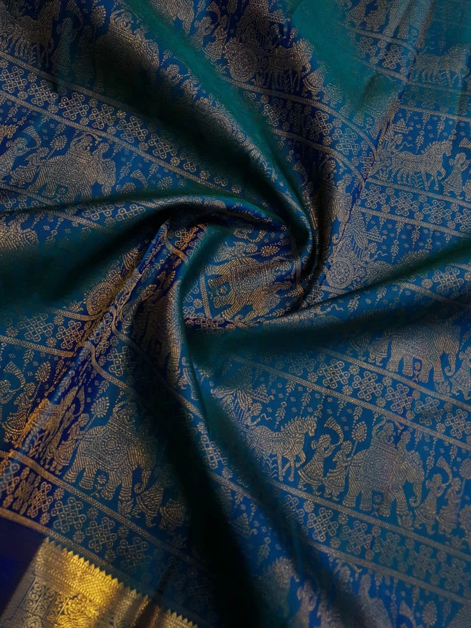 2G Pure Kanjivaram Silk Saree in Peacock Blue with Antique Gold Temple Border, Traditional Horse Butta & Traditional Motif Design | Silkmark Certified