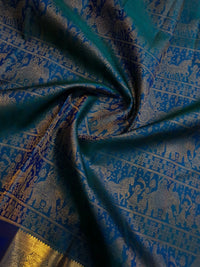 2G Pure Kanjivaram Silk Saree in Peacock Blue with Antique Gold Temple Border, Traditional Horse Butta & Traditional Motif Design | Silkmark Certified