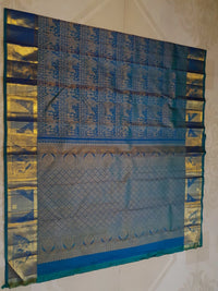 2G Pure Kanjivaram Silk Saree in Peacock Blue with Antique Gold Temple Border, Traditional Horse Butta & Traditional Motif Design | Silkmark Certified
