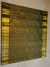 2G Pure  Kanjivaram Silk Saree in Deep Bottle Green with Antique Gold Elephant Butta and Rich Zari Border | Silkmark Certified