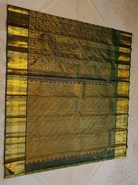 2G Pure  Kanjivaram Silk Saree in Deep Bottle Green with Antique Gold Elephant Butta and Rich Zari Border | Silkmark Certified