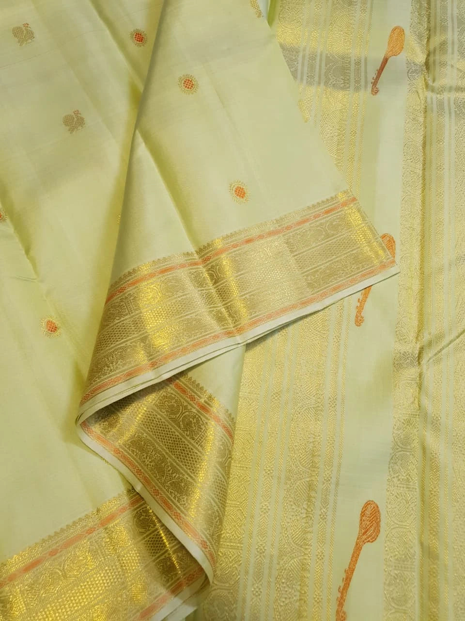 2G  Pure Kanjivaram Silk Saree in Pastel Green with Traditional Gold Zari Peacock Buttas and Rich Zari Border | Silkmark Certified