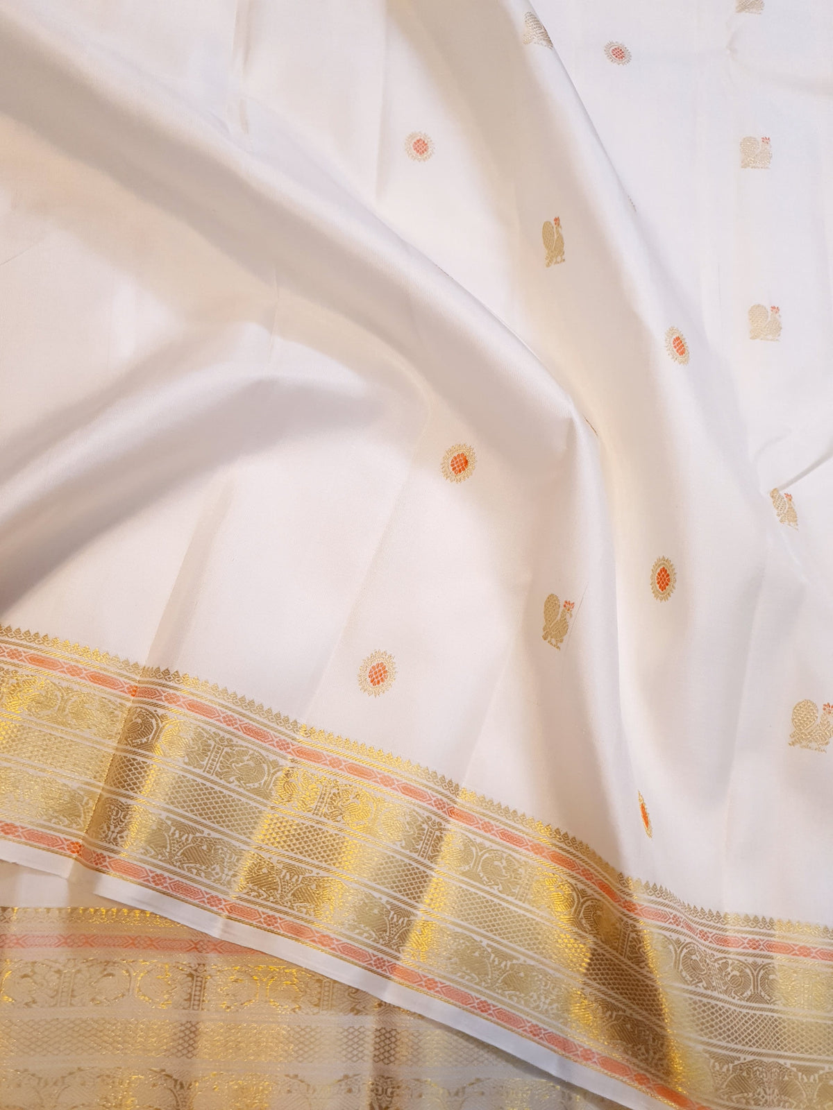 2G Pure Kanjivaram Silk Saree in Off-White with Peach Accents and Peacock Buttas with Rich Gold Zari Border | Silkmark Certified
