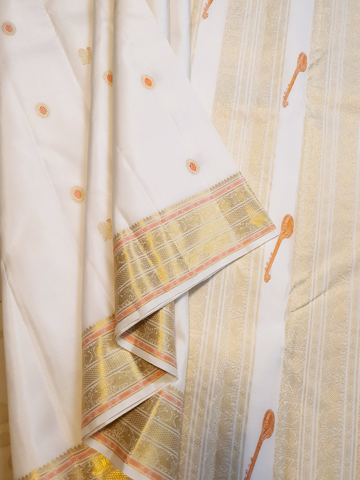 2G Pure Kanjivaram Silk Saree in Off-White with Peach Accents and Peacock Buttas with Rich Gold Zari Border | Silkmark Certified