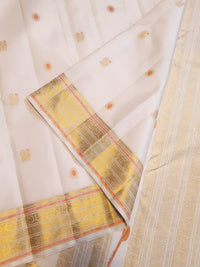 2G Pure Kanjivaram Silk Saree in Off-White with Peach Accents and Peacock Buttas with Rich Gold Zari Border | Silkmark Certified