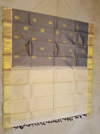 2G Pure Kanjivaram Silk Saree in Grey with Gold Zari Buttas & Green Border | Silkmark Certified
