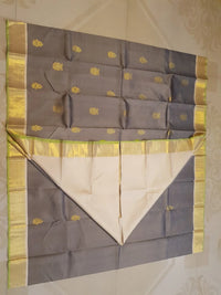 2G Pure Kanjivaram Silk Saree in Grey with Gold Zari Buttas & Green Border | Silkmark Certified
