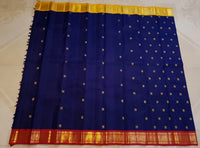 3G Pure Zari Ganga Jamuna Kanjivaram Silk Saree in Navy Blue with Gold Peacock Buttas & Red and Yellow Peacock Border | Silkmark Certified