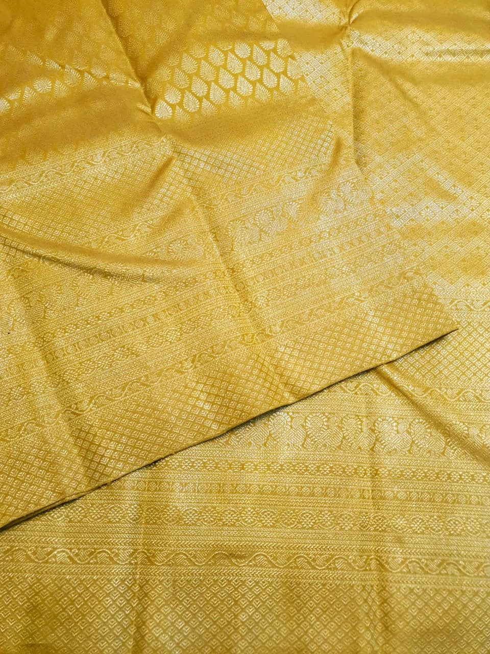 2G Pure  Kanjivaram Silk Saree in Golden Yellow with Full-Body Leaf Motifs & Rich Gold Zari Peacock  Border | Silkmark Certified