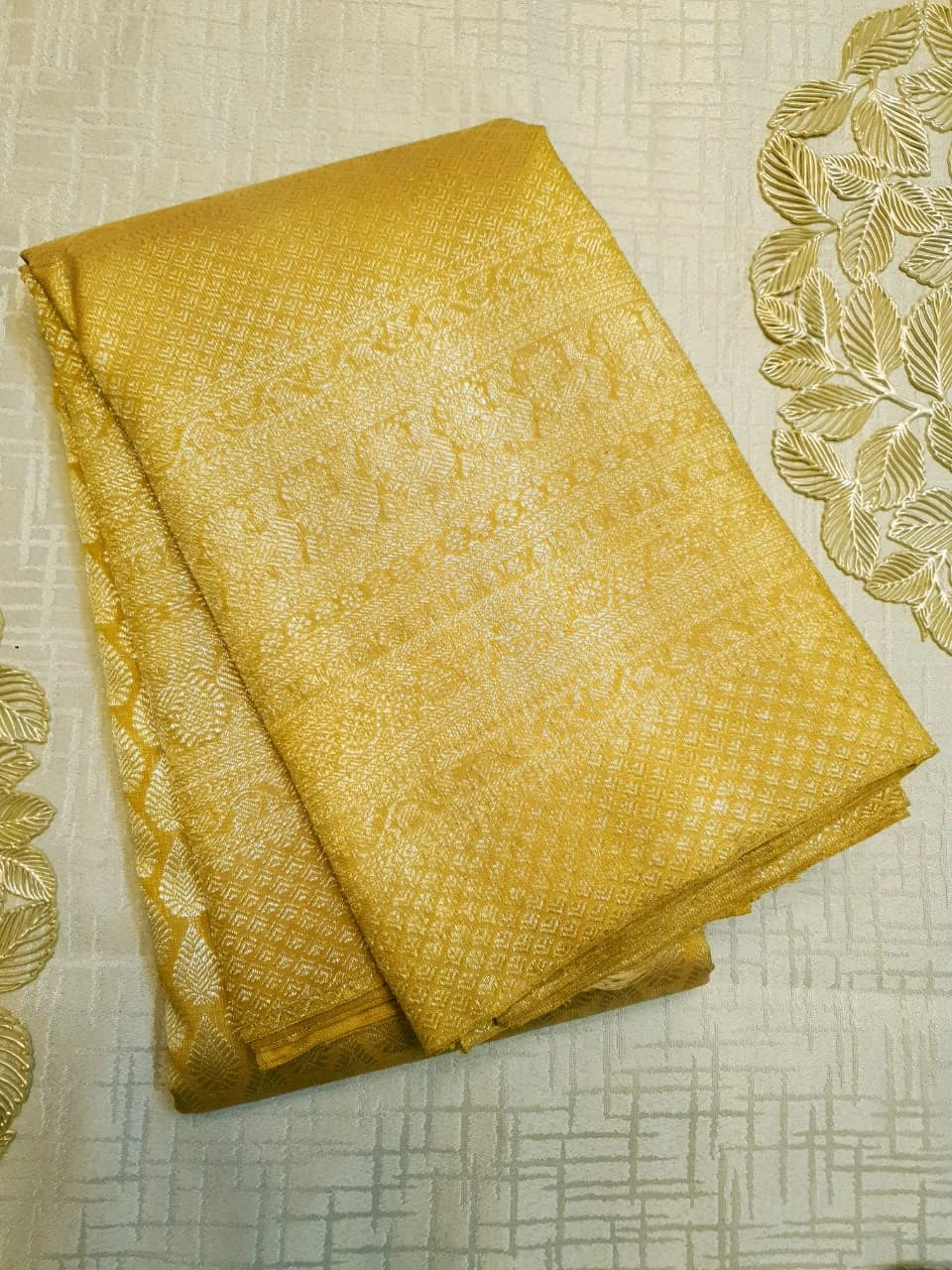 2G Pure  Kanjivaram Silk Saree in Golden Yellow with Full-Body Leaf Motifs & Rich Gold Zari Peacock  Border | Silkmark Certified