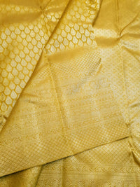 2G Pure  Kanjivaram Silk Saree in Golden Yellow with Full-Body Leaf Motifs & Rich Gold Zari Peacock  Border | Silkmark Certified