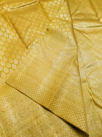 2G Pure  Kanjivaram Silk Saree in Golden Yellow with Full-Body Leaf Motifs & Rich Gold Zari Peacock  Border | Silkmark Certified