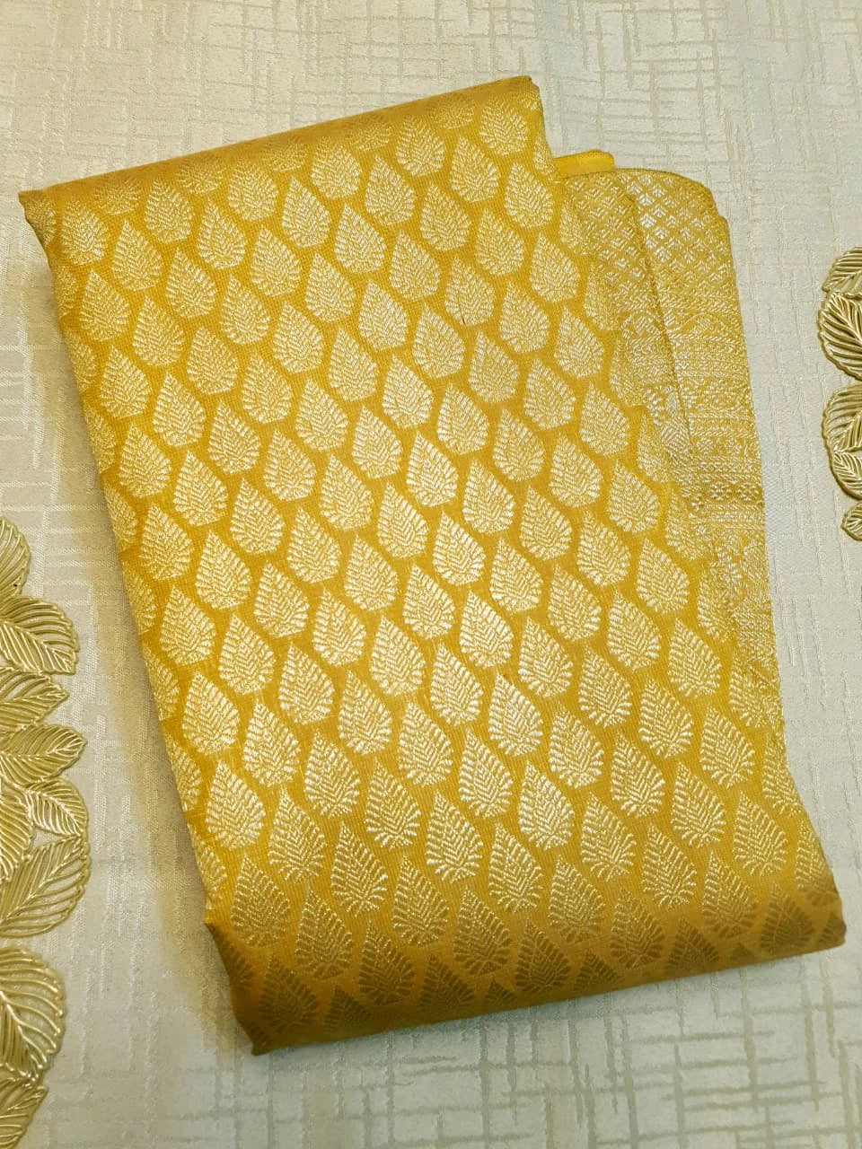 2G Pure  Kanjivaram Silk Saree in Golden Yellow with Full-Body Leaf Motifs & Rich Gold Zari Peacock  Border | Silkmark Certified