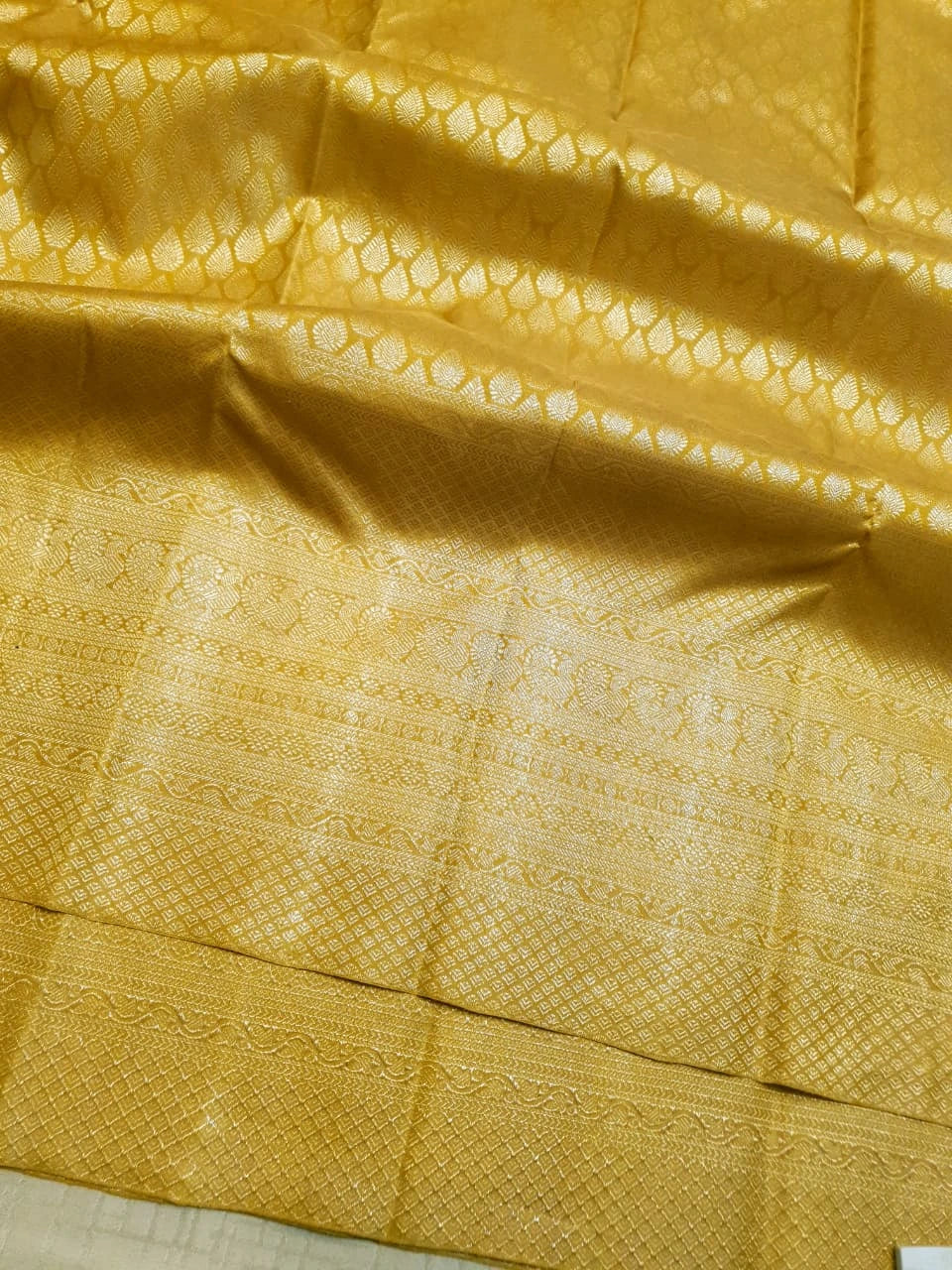2G Pure  Kanjivaram Silk Saree in Golden Yellow with Full-Body Leaf Motifs & Rich Gold Zari Peacock  Border | Silkmark Certified