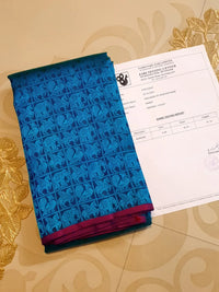 3G Pure Zari Kanjivaram Silk Saree in Ananda Blue with Traditional Elephant & Peacock Zari Motifs and Purple Border | Silkmark Certified