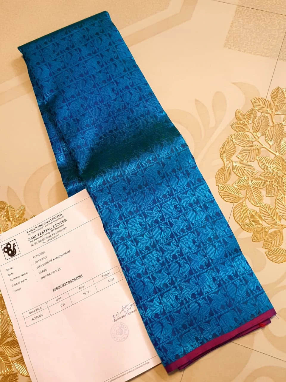 3G Pure Zari Kanjivaram Silk Saree in Ananda Blue with Traditional Elephant & Peacock Zari Motifs and Purple Border | Silkmark Certified