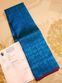 3G Pure Zari Kanjivaram Silk Saree in Ananda Blue with Traditional Elephant & Peacock Zari Motifs and Purple Border | Silkmark Certified