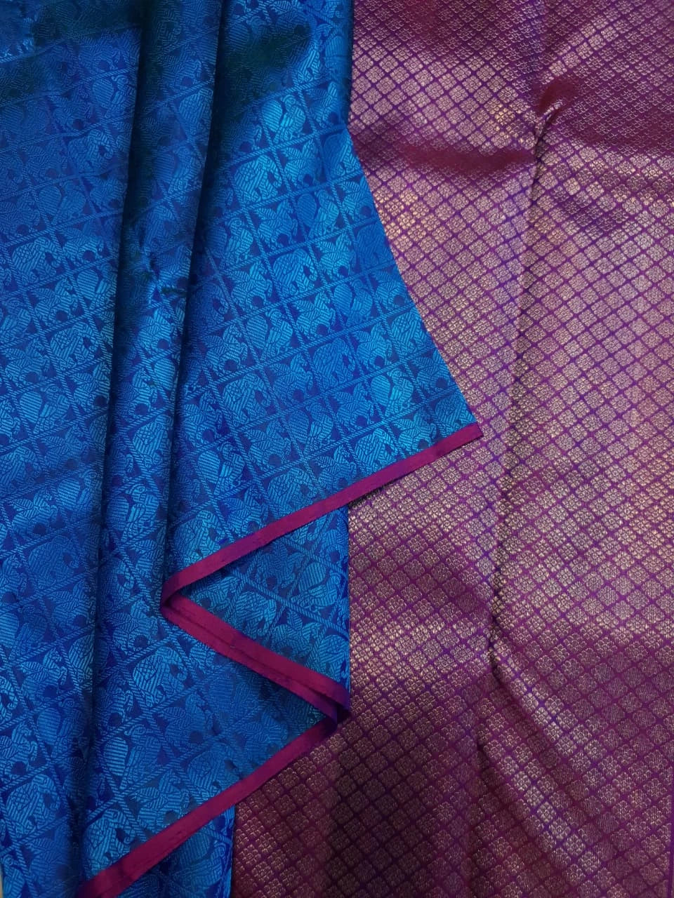 3G Pure Zari Kanjivaram Silk Saree in Ananda Blue with Traditional Elephant & Peacock Zari Motifs and Purple Border | Silkmark Certified
