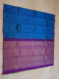 3G Pure Zari Kanjivaram Silk Saree in Ananda Blue with Traditional Elephant & Peacock Zari Motifs and Purple Border | Silkmark Certified