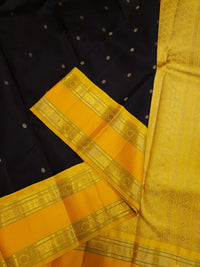 3G Pure Zari Kanjivaram Silk Saree in Black with Mustard Yellow Zari Border & Traditional Gold Zari Buttas | Silkmark Certified