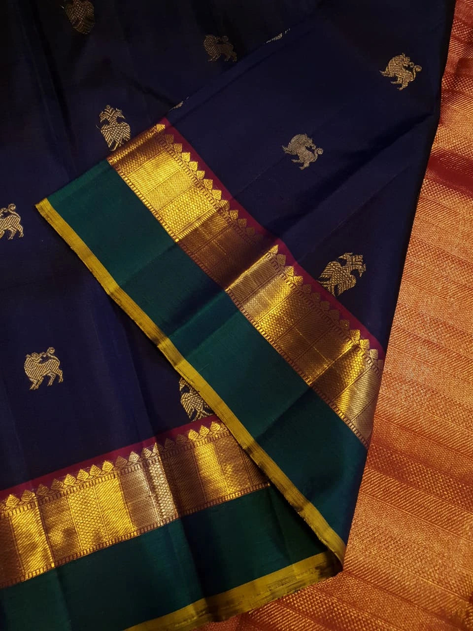 2G Pure Kanjivaram Silk Saree in Midnight Blue with Emerald Green Border & Rich Gold Zari Peacock Buttas | Silkmark Certified