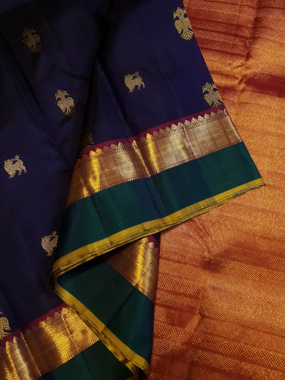 2G Pure Kanjivaram Silk Saree in Midnight Blue with Emerald Green Border & Rich Gold Zari Peacock Buttas | Silkmark Certified